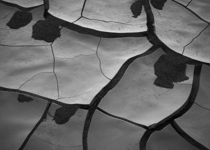 Monochromatic image of mud cracks in Death Valley National park