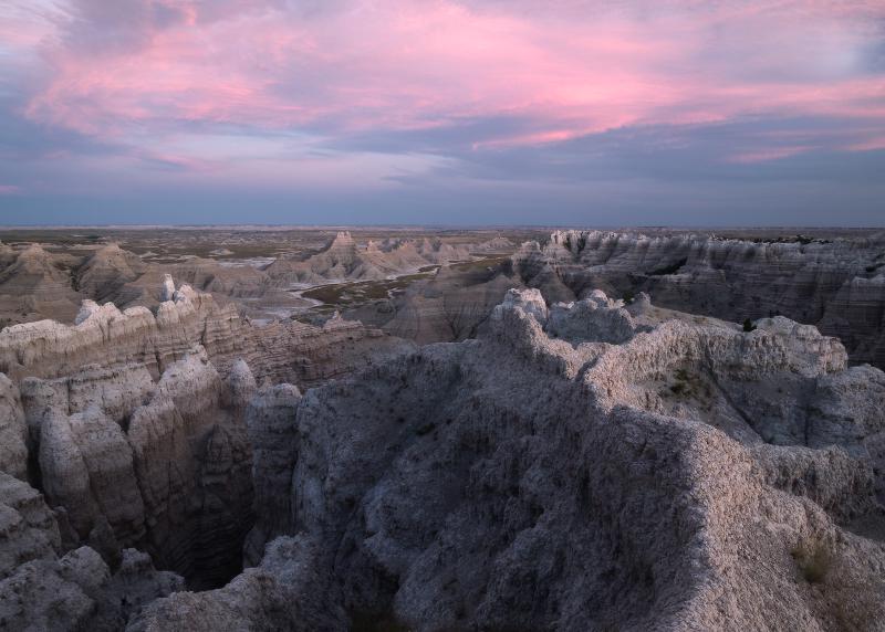 Vibrant pink sunset in Badlands National Park