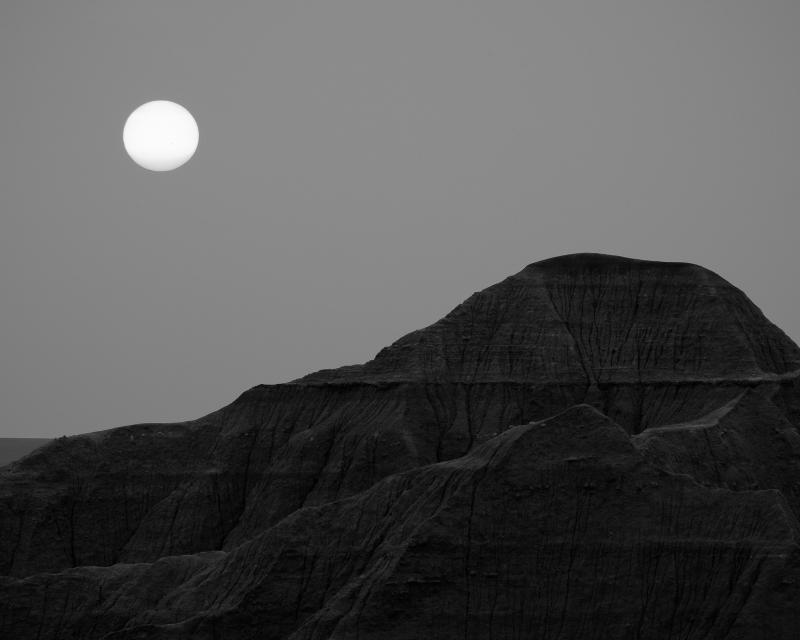 Black and white sunrise over Badlands National Park